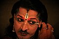 Artist busy in make up for Dashavatara folk theatre in Konkan region of Maharashtra state in India