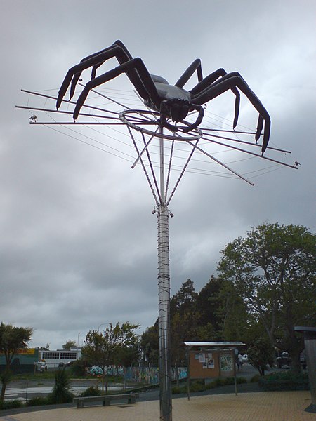 Local sculpture of the suburb's spider icon.