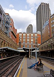 Barbican tube station platform view with estate tower.jpg