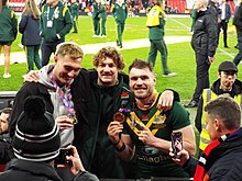 Graham (centre) and Angus Crichton (right) celebrating winning the 2021 RLWC Final Campbell Graham & Angus Crichton.jpg