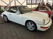 Porsche 911 (964), introduced in 1989, was the first to be offered with Porsche's Tiptronic transmission and four-wheel drive. Classic Moto Show 2014 (115).JPG