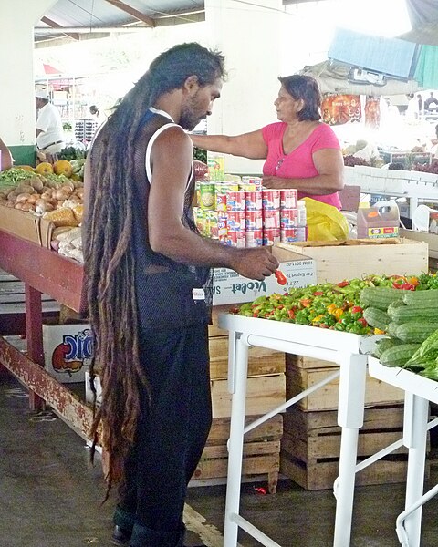 File:Customer makes purchase, Debe Market, Trinidad and Tobago.JPG