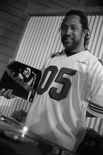 DJ Kool Herc, of Jamaican background, is recognized as one of the earliest hip hop DJs and artists. Some credit him with officially originating hip hop music through his 1973 "Back to School Jam".[38]