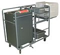 Election Systems & Software M100 ballot scanner on cart with AutoMark ballot marking device