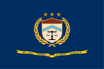 Initial flag of ATF as part of the U.S. Department of Justice; the Latin scroll was later replaced with one bearing the agency's name.