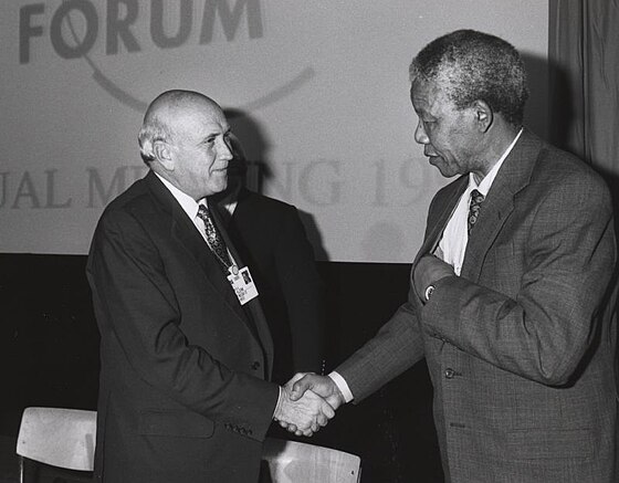 FW de Klerk and Nelson Mandela shake hands in January 1992