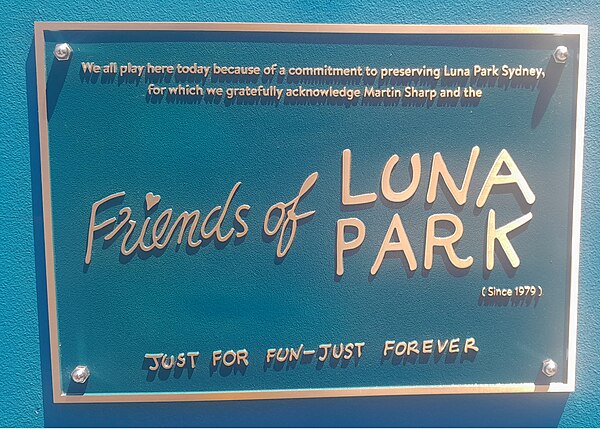 Plaque commemorating the efforts of Friends of Luna Park activists and in particular Sharp, installed in 2023.