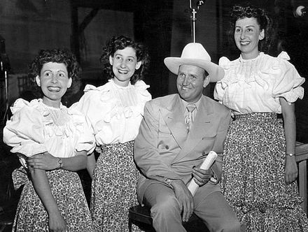 Gene Autry with the Pinafores, who sang on his weekly radio show, 1948