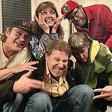 Kassie Carlson with members of Pavement in 2022. From left to right: Mark Ibold, Kassie Carlson, Bob Nastanovich, Steve West, Stephen Malkmus. Guerilla Toss - Pavement.jpg
