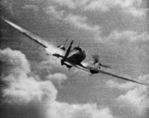 Still from camera gun footage taken from a Spitfire of No. 609 Squadron showing a Heinkel He 111 taking hits in the port engine on 25 September 1940.