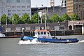 Nederlands: Sleepboot OCEAAN afvarend op de Nieuwe Maas voor Rotterdam.