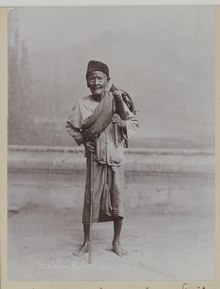 A traditional Malay healer in Singapore, the Straits Settlements - circa 1890. KITLV - 6538 - Lambert & Co., G.R. - Singapore - Malay witch doctor in the Straits Settlements - circa 1890.tif