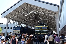 EF58 150 (left) and EF81 103 (right) in the Twilight Plaza zone in May 2016