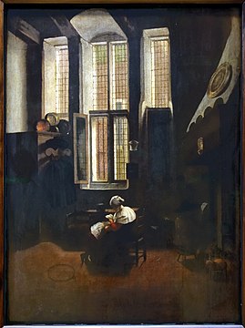 Interior with seated woman and a boy