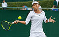 Liu Fangzhou competing in the second round of the 2015 Wimbledon Qualifying Tournament at the Bank of England Sports Grounds in Roehampton, England. The winners of three rounds of competition qualify for the main draw of Wimbledon the following week.