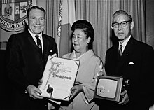 Los Angeles Mayor Sam Yorty Presenting Matsushita Day Certificate to Mr. and Mrs. Kōnosuke Matsushita at Los Angeles City Hall.jpg