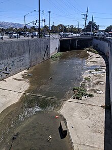 The tributary Lower Silver Creek where it comes from under McKee Road and King Road in San Jose