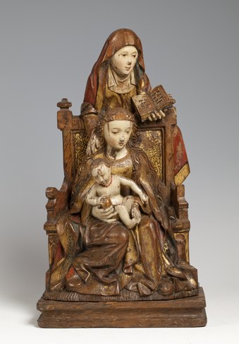 Skulptur der Saint Anne har en bok og barnet en klode