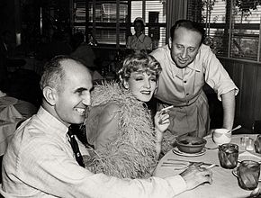 Marshall (left) with Marlene Dietrich and producer Joe Pasternak on the set of the 1939 film Destry Rides Again