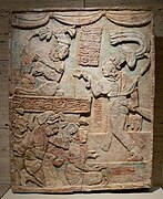 Relief showing Aj Chak Maax presenting captives before ruler Itzamnaaj B'alam III of Yaxchilan; 22 August 783; limestone with traces of pigment; height: 1.15 m (3 ft. 111⁄4 in.); Kimbell Art Museum (Fort Worth, Texas, USA). King Itzamnaaj B'alam III (Shield Jaguar III), ruler of Yaxchilan (in Mexico), seated on a throne inscribed with his name, receives a warlord, Aj Chak Maax (He of Red Monkey), who presents him with 3 captives on he steps leading to the throne room. Their earrings have been removed and replaced with strips of paper as a sign of humiliation. This may be referred to in the text, whixh states that the prisoners were "adorned" for 3 days after their capture