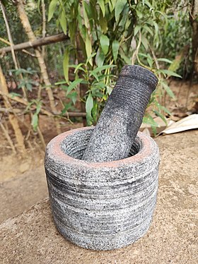 Mortar & Pestle made up of stone, it is used in Indian kitchen for crushing & grinding some ingredients like garlic, ginger, green chillies etc., India