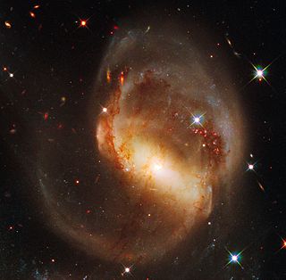 NGC 7319 Highly distorted spiral galaxy in the constellation Pegasus