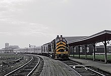 Nickel Plate train number 5, City of Chicago at Englewood Union Station on April 21, 1965. NKP RS36 875 at Englewood Union Station, Chicago, IL Train 5, The City of Chicago, on April 21, 1965 01 (24689049092).jpg