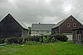 Residential stable house and two barns in a three-sided courtyard