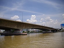 Rama VII Bridge (downstream, west bank of Chao Phraya River).JPG