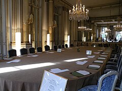 The table in the Salon Murat (Murat Room), where the President holds meetings with the Government of France.