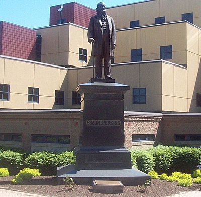 Statue of Simon Perkins in front of the College of Business Administration.