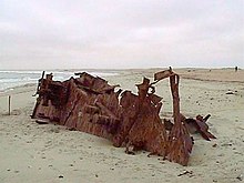 One of many rusting ship hulls along the Skeleton Coast (Dunedin Star) Skelettkuste.jpg