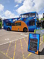 Southern Vectis 639 Steephil Cove (R739 XRV), a Volvo Olympian/Northern Counties Palatine, in Ryde, Isle of Wight bus station on the Downs Tour. A promotional sign for the Downs Tour can also be seen.