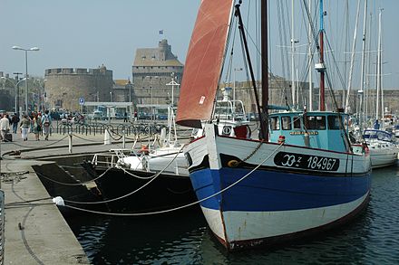 Boats in the harbor, with Intramuros in the background