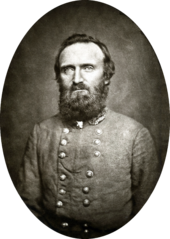 Middle aged man with large beard in military uniform