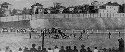 Cumberland vs. Georgia Tech game at Grant Field in 1916; looking east toward Techwood Drive (note houses also visible in other early photos) Tech vs Cumberland 1916.jpg