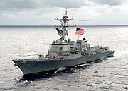 The guided-missile destroyer USS Stockdale (DDG 106) flies a 240-foot long homeward bound pennant from its mast as it steams through the Pacific Ocean on 131105-N-ZZ999-003.jpg