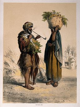 Two Egyptian peasants, the man smokes a pipe and the woman h Wellcome V0019291