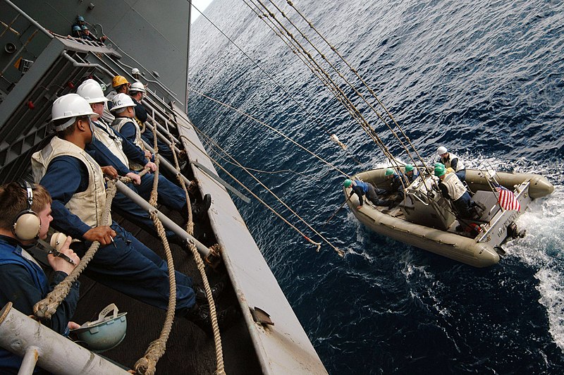 File:US Navy 071023-N-3136P-088 Deck Department Sailors watch a rigid hull inflatable boat as it is recovered after small boat operations aboard USS Kitty Hawk (CV 63). RHIBs are mainly used for security and rescue operations.jpg