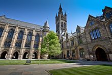 Collegiate Gothic architecture is a popular theme within the aesthetic. University of Glasgow Quadrangle.jpg