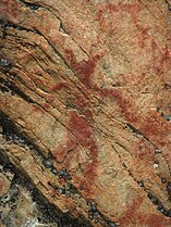 Sarvipäinen ihmishahmo Värikallion muinaisessa kallio- maalauksessa, Suomussalmi