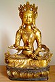 Uma estatueta de Vajrasattva segurando um vajra enquanto medita.