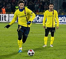 Ibrahimović preparing to strike a free kick for Barcelona in the UEFA Champions League with Xavi (right)