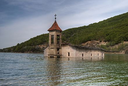 The submerged Church of Saint Nicholas (Summer) often completely resurfaces when the lake level lowers in summer