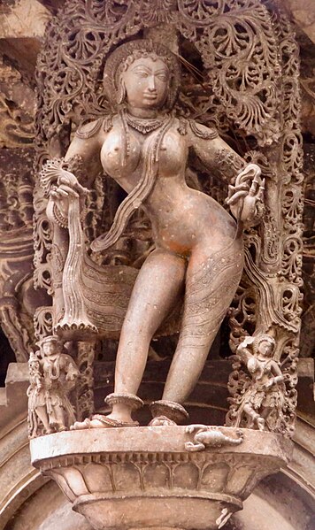 File:12th-century sculpture at Belur Hindu temple, sculpture showing nude woman with a scorpion below.jpg