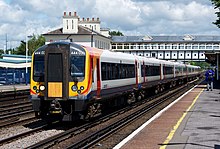 A pair of South West Trains Class 444s pass through Eastleigh on a midday service to Weymouth in July 2014 14448426332 a41a268157 o (444030 at Eastleigh) (XAM-E1).jpg