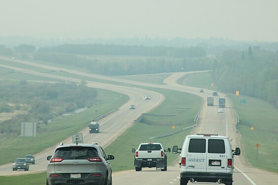 Queen Elizabeth II Highway near Ponoka during a hazy morning due to the 2019 Alberta wildfires