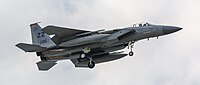 A US Air Force F-15C Eagle, tail number 85-0115, on final approach at Kadena Air Base in Okinawa, Japan