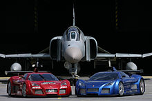 The two Gumpert Apollo Prototypes with an F-4 Phantom II 2 Apollos (Prototype) with F-4 Phantom.jpg
