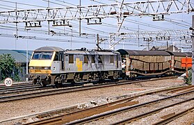 BR Class 90/1 hauling car train at Stratford